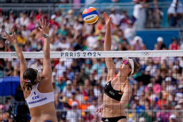 Barbora Hermannova (Czech Republic) and Svenja Müller (Germany) in action during the Women s Beach Volleybal Preliminary Phase - Pool C match between Svenja Müller Cinja Tillmann of Germany v Barbora Hermannova Marie-Sara Å tochlova of Czech Republic on Day 5 of the Olympic Games, Olympische Spiele, Olympia, OS Paris 2024 at Eiffel Tower Stadium on July 31, 2024 in Paris, France.