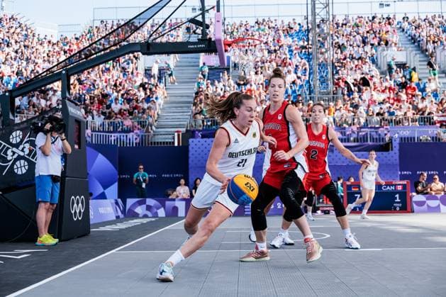 FRA, Paris, Olympic Games Paris 2024, 01 08 2024, 3x3 Basketball Women Germany Canada, La Concorde 1 Svenja Brunckhorst Germany, 21 am ball, Michelle Plouffe Canada, 1 Copyright: HMBxMedia SteffiexWunderl