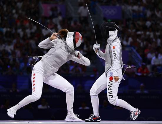 (240801) -- PARIS, Aug. 1, 2024 -- Eleanor Harvey (L) of Canada competes against Miyawaki Karin of Japan during the women s foil team bronze medal match of fencing between Canada and Japan at the Paris 2024 Olympic Games, Olympische Spiele, Olympia, OS in Paris, France, Aug. 1, 2024. ) (PARIS2024) FRANCE-PARIS-OLY-FENCING ZhangxHongxiang 