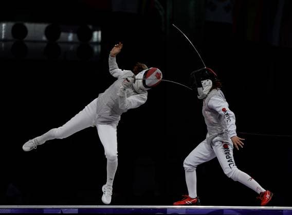 (240801) -- PARIS, Aug. 1, 2024 -- Eleanor Harvey (L) of Canada competes against Ueno Yuka of Japan during the women s foil team bronze medal match of fencing between Canada and Japan at the Paris 2024 Olympic Games, Olympische Spiele, Olympia, OS in Paris, France, Aug. 1, 2024. ) (PARIS2024) FRANCE-PARIS-OLY-FENCING FeixMaohua 