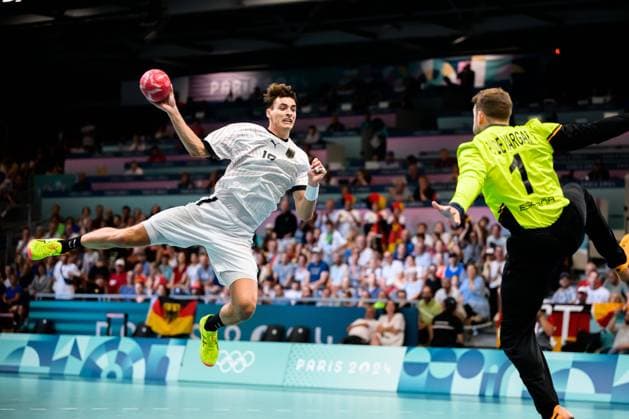Paris, France Handball Men Preliminary Round Group A Germany Spain from left Julian Köster Koester Germany , Goalkeeper Gonzalo Perez de Vargas Spain Paris South Paris Arena 6 France
