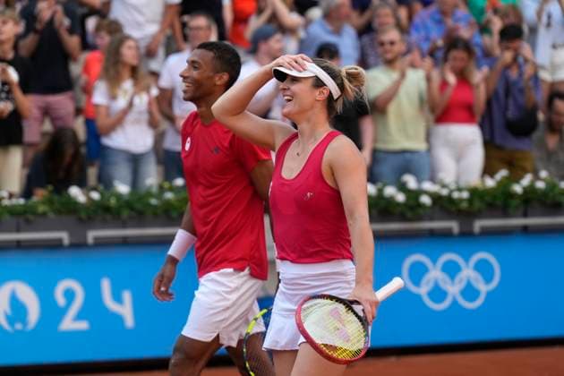 August 2, 2024, Paris, France: Canada s Felix Auger-Aliassime and Gabriela Dabrowski react after their win in the mixed doubles bronze-medal match against Demi Schuurs and Wesley Koolhoof of the Netherlands at the Summer Olympics in Paris on Friday, Aug.2, 2024. Canada News - August 2, 2024  - ZUMAc35_ 20240802_zaf_c35_028 Copyright: xAdrianxWyldx