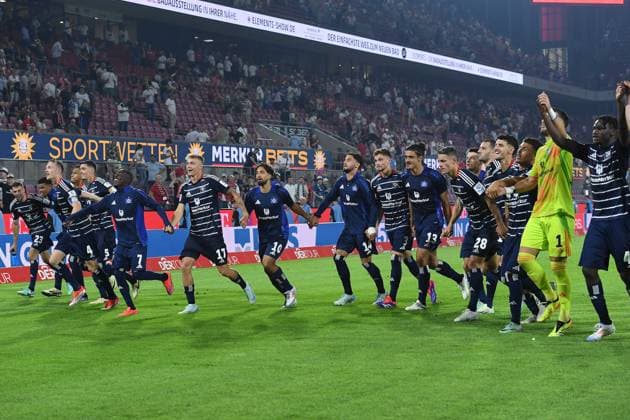 Soccer 2 Bundesliga 1 Matchday 1 FC Köln Hamburger SV on 02 08 2024 at RheinEnergieStadion in Cologne Hamburg players celebrate the away win with their fans DFL regulations prohibit any use of photographs as image sequences and or quasi video xRx