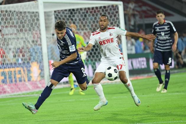 GER, 2 FBL 1 FC Koeln vs Hamburger SV 02 08 2024, Rheinenergie Stadion, Koeln, GER, 2 FBL 1 FC Koeln vs Hamburger SV, in the picture duel in front of the goal Linton Maina FC Koeln 37 , William Mikelbrencis HSV 2 , nordphotoxGmbHx xMeuter nph00351