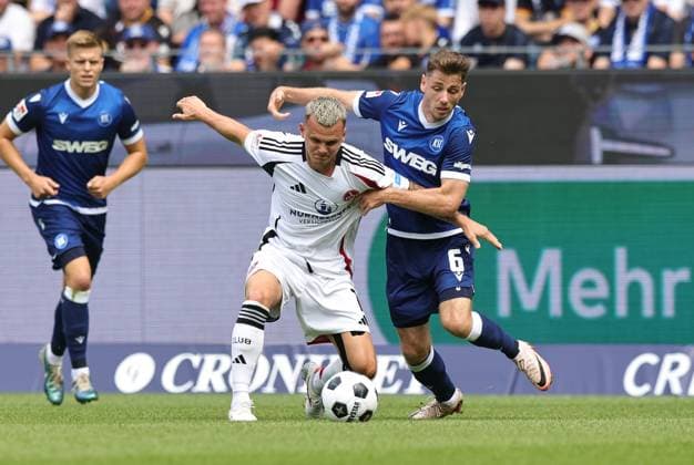 03 08 2024 Soccer Season 2024 2025 2 Soccer Bundesliga 01 Matchday Karlsruher SC KSC 1 FC Nürnberg FCN Club Sportfoto Zink DaMa xdaxmax DFL regulations prohibit any use of photographs as image sequences and or quasi video only for editorial use Florian Pick 7, 1 FC Nürnberg FCN Leon Jensen 6, Karlsruher SC KSC