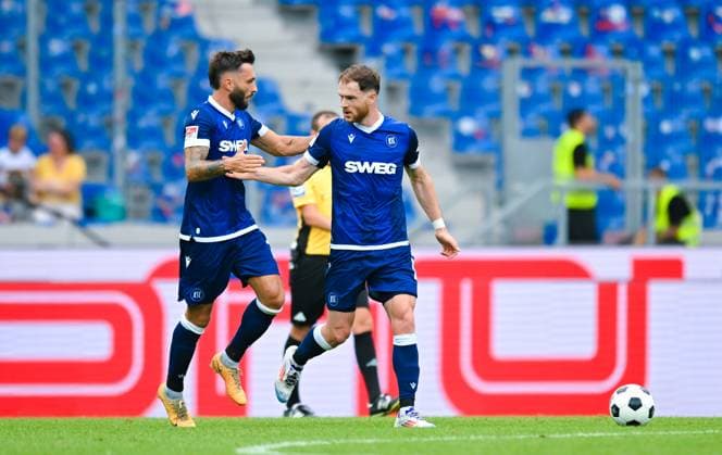 Fabian Schleusener Karlsruher SC and Budu Zivzivadze Karlsruher SC celebrate the first goal by their team, 2 Bundesliga, Karlsruher SC vs 1 FC Nuernberg, BBBank Wildpark on August 03, 2024 in Karlsruhe, Germany Photo by Silas Schueller DeFodi Images Fabian Schleusener Karlsruher SC and Budu Zivzivadze Karlsruher SC celebrate the first goal by their team, 2 Bundesliga, Karlsruher SC vs 1 FC Nuernberg, BBBank Wildpark on August 3, 2024 in Karlsruhe, Germany Photo by Silas Schueller DeFodi Images Defodi 738 738 KSCFCN 20240803 194 Defodi-738