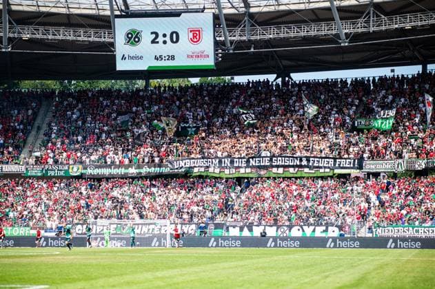 03 08 2024 Soccer, 2024 2025, 2 Bundesliga, 1 Matchday, Hannover 96 SSV Jahn Regensburg Fans Hannover with poster Unbending into the new season and fire free DFL REGULATIONS PROHIBIT ANY USE OF PHOTOGRAPHS AS IMAGE SEQUENCES AND OR QUASI VIDEO