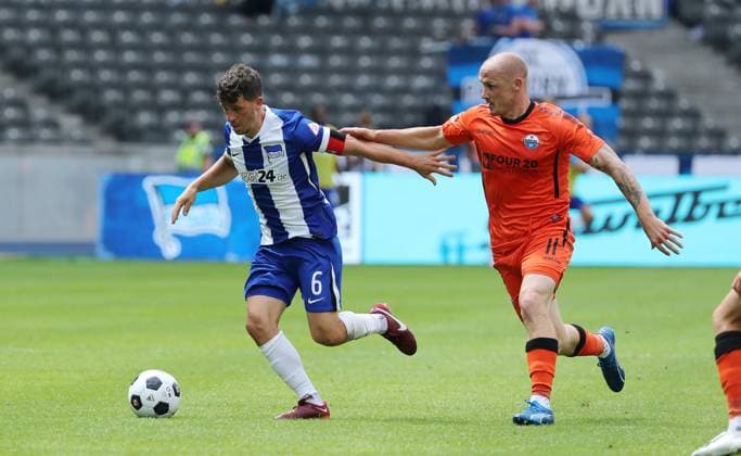 Diego Demme in a duel with Sven Michel Match scene Action Sport Football Soccer DFL 2 Bundesliga Men 1 Matchday Season 2024 2025 03 08 2024 Hertha BSC Berlin vs SC Paderborn SCP DFL regulations prohibit any use of photographs as image sequences and or quasi video