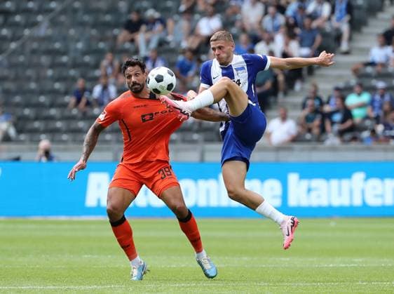Adriano Grimaldi in a duel with Marton Dardai Match scene Action Sport Football Soccer DFL 2 Bundesliga Men 1 Matchday Season 2024 2025 03 08 2024 Hertha BSC Berlin vs SC Paderborn SCP DFL regulations prohibit any use of photographs as image sequences and or quasi video