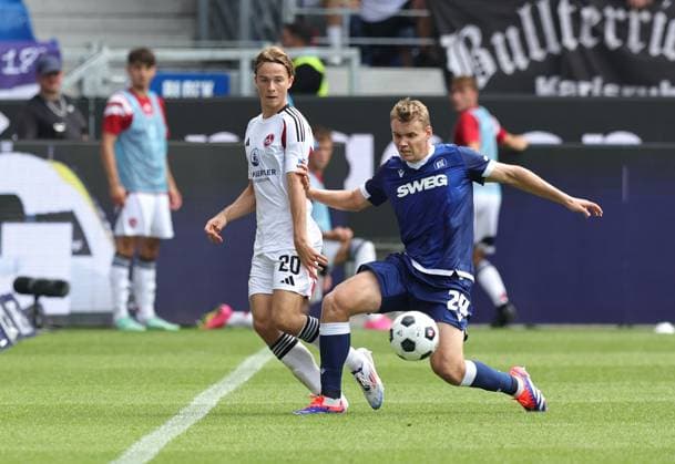 03 08 2024 Soccer Season 2024 2025 2 Soccer Bundesliga 01 Matchday Karlsruher SC KSC 1 FC Nuremberg FCN Club Sportfoto Zink DaMa xdaxmax DFL regulations prohibit any use of photographs as image sequences and or quasi video only for editorial use Caspar Jander 20, 1 FC Nuremberg FCN Lasse Günther Guenther 29, Karlsruher SC KSC