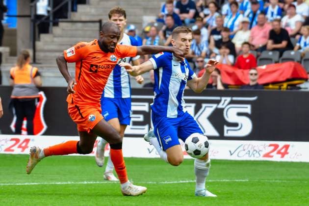 03 08 2024, xlakx, Soccer 2 Bundesliga, Hertha BSC Berlin SC Paderborn emspor, v l David Kinsombi SC Paderborn 07 ,Jonjoe Kenny Hertha BSC ,duel, fight, tackle DFL DFB REGULATIONS PROHIBIT ANY USE OF PHOTOGRAPHS as IMAGE SEQUENCES and or QUASI VIDEO Daniel Lakomski JAN Huebner Berlin