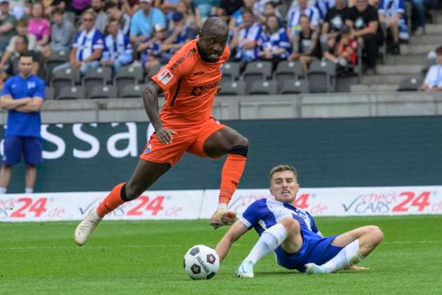 GER, Berlin, Fußball, Hertha BSC vs SC Paderborn, 2 Bundesliga, Olympiastadion, 03 08 2024, v l David Kinsombi SC Paderborn 07 , Jonjoe Kenny Hertha 16 , Zweikampf, Action, Kampf, kaempft um den Ball, dfl dfb regulations prohibit any use of photographs as image sequences and or quasi video Copyright: HMBxMedia UwexKoch