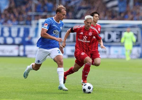 04 08 2024, xdcx, Soccer 2 Bundesliga, SV Darmstadt 98 Fortuna Düsseldorf, emonline, emspor, despor, v l , Oscar Vilhelmsson SV Darmstadt 98 , Shinta Appelkamp Fortuna Düsseldorf DFL DFB REGULATIONS PROHIBIT ANY USE OF PHOTOGRAPHS AS IMAGE SEQUENCES AND OR QUASI VIDEO Copyright: HMBxMedia Claus