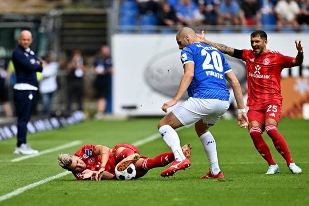 04 08 2024, xfux, Fußball 2 Bundesliga, SV Darmstadt 98 Fortuna Düsseldorf emspor, v l Felix Klaus Fortuna Duesseldorf Düsseldorf , Aleksandar Vukotic SV Darmstadt 98 , Matthias Zimmermann Fortuna Duesseldorf Düsseldorf DFL DFB REGULATIONS PROHIBIT ANY USE OF PHOTOGRAPHS as IMAGE SEQUENCES and or QUASI VIDEO Licensing of the photographic work to SV Darmstadt 1898 e V and subsidiaries is not permitted No release of or sale to SV Darmstadt 1898 e V Darmstadt