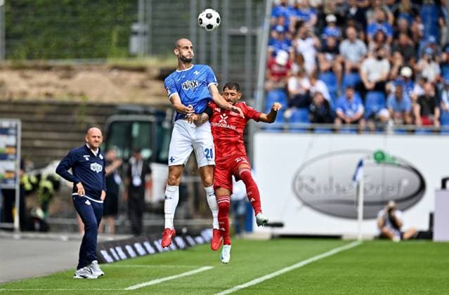 04 08 2024, xfux, Fussball 2 Bundesliga, SV Darmstadt 98 Fortuna Düsseldorf emspor, v l Aleksandar Vukotic SV Darmstadt 98 , Matthias Zimmermann Fortuna Duesseldorf Düsseldorf Kopfball, Kopfballduell DFL DFB REGULATIONS PROHIBIT ANY USE OF PHOTOGRAPHS as IMAGE SEQUENCES and or QUASI VIDEO Licensing of the photographic work to SV Darmstadt 1898 e V and subsidiaries is not permitted No release of or sale to SV Darmstadt 1898 e V Darmstadt