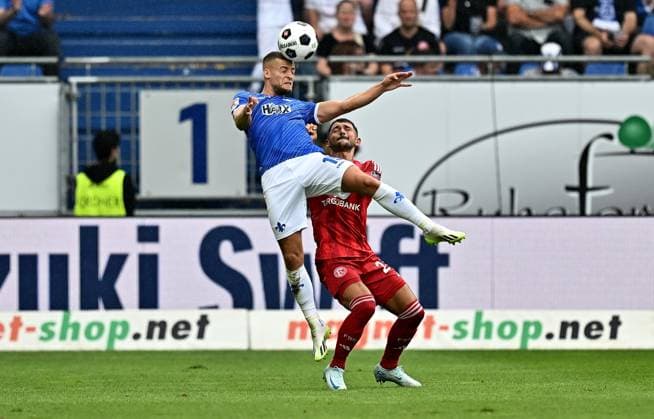 04 08 2024, xfux, Fußball 2 Bundesliga, SV Darmstadt 98 Fortuna Düsseldorf emspor, v l Fabian Nürnberger Nuernberger SV Darmstadt 98 , Matthias Zimmermann Fortuna Duesseldorf Düsseldorf Kopfball, Kopfballduell DFL DFB REGULATIONS PROHIBIT ANY USE OF PHOTOGRAPHS as IMAGE SEQUENCES and or QUASI VIDEO Licensing of the photographic work to SV Darmstadt 1898 e V and subsidiaries is not permitted No release of or sale to SV Darmstadt 1898 e V Darmstadt