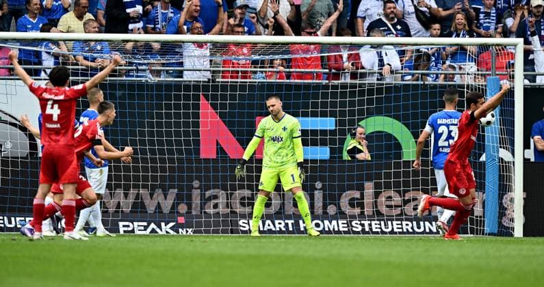 04 08 2024, xfux, Fußball 2 Bundesliga, SV Darmstadt 98 Fortuna Düsseldorf emspor, v l Torschuetze Goal scorer Matthias Zimmermann Fortuna Duesseldorf Düsseldorf not in picture , Marcel Schuhen SV Darmstadt 98 , Tim Oberdorf Fortuna Duesseldorf Düsseldorf , Klaus Gjasula SV Darmstadt 98 Goal scored, Goal to 0 1 DFL DFB REGULATIONS PROHIBIT ANY USE OF PHOTOGRAPHS as IMAGE SEQUENCES and or QUASI VIDEO Licensing of the photographic work to SV Darmstadt 1898 e V and subsidiaries is not permitted No release of or sale to SV Darmstadt 1898 e V Darmstadt