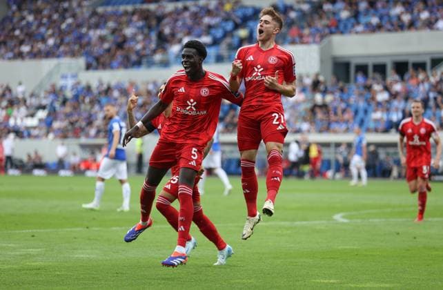 04 08 2024, xdcx, Fußball 2 Bundesliga, SV Darmstadt 98 Fortuna Düsseldorf, emonline, emspor, despor, v l , Torjubel zum 0 2 durch Tim Rossmann Fortuna Düsseldorf , Joshua Quarshie Fortuna Düsseldorf , Goal celebration, celebrate the goal DFL DFB REGULATIONS PROHIBIT ANY USE OF PHOTOGRAPHS AS IMAGE SEQUENCES AND OR QUASI VIDEO Copyright: HMBxMedia Claus