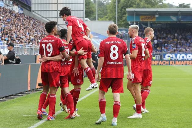 04 08 2024, xtvx, Fußball 2 Bundesliga, SV Darmstadt 98 Fortuna Düsseldorf emspor, v l Goal scored, Tor zum 0 2 Tim Rossmann Fortuna Duesseldorf Torjubel, Goal celebration, celebrate the goal, celebrates scoringJoshua Quarshie Fortuna Duesseldorf Matthias Zimmermann Fortuna Duesseldorf Tim Rossmann Fortuna Duesseldorf DFL DFB REGULATIONS PROHIBIT ANY USE OF PHOTOGRAPHS as IMAGE SEQUENCES and or QUASI VIDEO Darmstadt