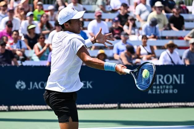 ATP National Bank Open 2024 MONTREAL, QC, CANADA AUGUST 04 Rinky Hijikata AUS returns the ball during a qualifying round match at ATP National Bank Open on August 04, 2024 at IGA Stadium in Montreal, QC, Canada Photo by David Kirouac Copyright: xBEAUTIFULxSPORTS Kirouacx