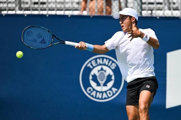 ATP National Bank Open 2024 MONTREAL, QC, CANADA AUGUST 04 Rinky Hijikata AUS retruns the ball during a qualifying round match at ATP National Bank Open on August 04, 2024 at IGA Stadium in Montreal, QC, Canada Photo by David Kirouac Copyright: xBEAUTIFULxSPORTS Kirouacx