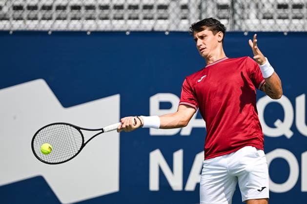 MONTREAL, QC - AUGUST 04: Camilo Ugo Carabelli (ARG) returns the ball during a qualifying round match at ATP, Tennis Herren National Bank Open on August 04, 2024 at IGA Stadium in Montreal, QC (Photo by David Kirouac Icon Sportswire) TENNIS: AUG 04 National Bank Open EDITORIAL USE ONLY Icon240804001