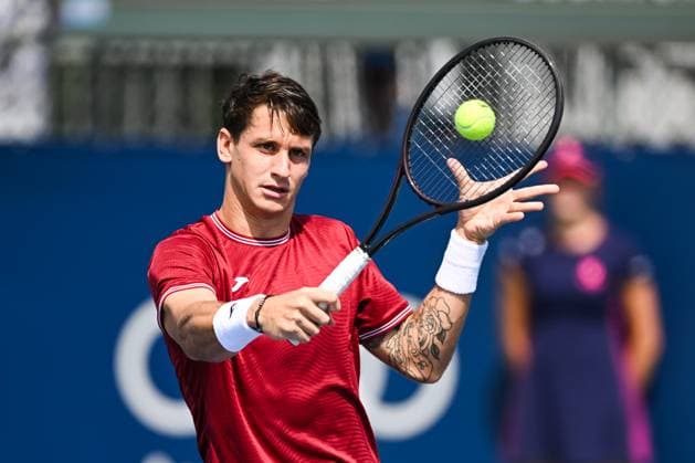 MONTREAL, QC - AUGUST 04: Camilo Ugo Carabelli (ARG) returns the ball during a qualifying round match at ATP, Tennis Herren National Bank Open on August 04, 2024 at IGA Stadium in Montreal, QC (Photo by David Kirouac Icon Sportswire) TENNIS: AUG 04 National Bank Open EDITORIAL USE ONLY Icon240804003