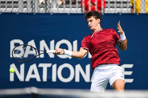 MONTREAL, QC - AUGUST 04: Camilo Ugo Carabelli (ARG) returns the ball during a qualifying round match at ATP, Tennis Herren National Bank Open on August 04, 2024 at IGA Stadium in Montreal, QC (Photo by David Kirouac Icon Sportswire) TENNIS: AUG 04 National Bank Open EDITORIAL USE ONLY Icon240804007