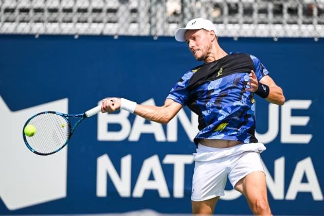 MONTREAL, QC - AUGUST 04: James Duckworth (AUS) returns the ball during a qualifying round match at ATP, Tennis Herren National Bank Open on August 04, 2024 at IGA Stadium in Montreal, QC (Photo by David Kirouac Icon Sportswire) TENNIS: AUG 04 National Bank Open EDITORIAL USE ONLY Icon240804012