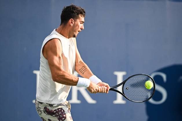 MONTREAL, QC - AUGUST 04: Thanasi Kokkinakis (AUS) returns the ball during a qualifying round match at ATP, Tennis Herren National Bank Open on August 04, 2024 at IGA Stadium in Montreal, QC (Photo by David Kirouac Icon Sportswire) TENNIS: AUG 04 National Bank Open EDITORIAL USE ONLY Icon240804020