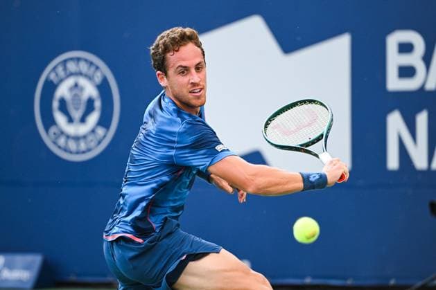MONTREAL, QC - AUGUST 04: Roberto Carballes Baena (ESP) returns the ball during a qualifying round match at ATP, Tennis Herren National Bank Open on August 04, 2024 at IGA Stadium in Montreal, QC (Photo by David Kirouac Icon Sportswire) TENNIS: AUG 04 National Bank Open EDITORIAL USE ONLY Icon240804024