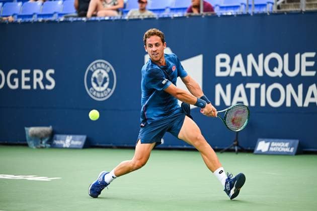 MONTREAL, QC - AUGUST 04: Roberto Carballes Baena (ESP) returns the ball during a qualifying round match at ATP, Tennis Herren National Bank Open on August 04, 2024 at IGA Stadium in Montreal, QC (Photo by David Kirouac Icon Sportswire) TENNIS: AUG 04 National Bank Open EDITORIAL USE ONLY Icon240804027
