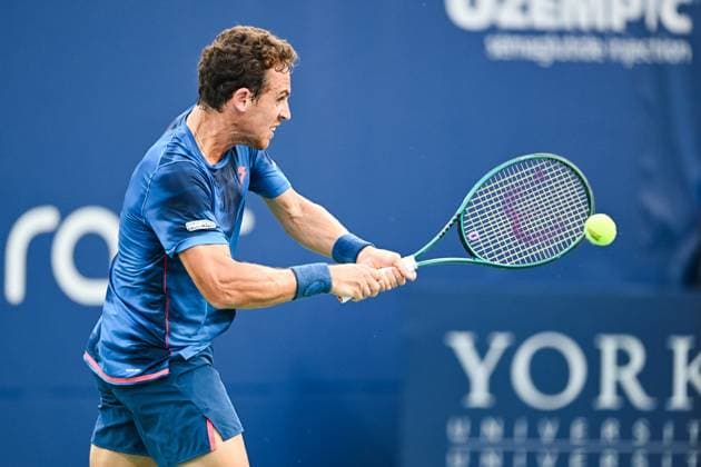 MONTREAL, QC - AUGUST 04: Roberto Carballes Baena (ESP) returns the ball during a qualifying round match at ATP, Tennis Herren National Bank Open on August 04, 2024 at IGA Stadium in Montreal, QC (Photo by David Kirouac Icon Sportswire) TENNIS: AUG 04 National Bank Open EDITORIAL USE ONLY Icon240804030