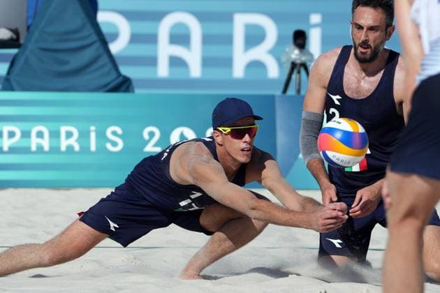 Samuele Cottafava and Paolo Nicolai during a men™s beach volley match between Italy and USA at 2024 Olympics, Monday, August 5, 2024, in Paris, France.  Copyright: xGianxMattiaxD Alberto LaPressex
