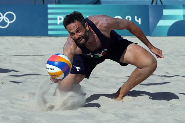 Samuele Cottafava and Paolo Nicolai during a men™s beach volley match between Italy and USA at 2024 Olympics, Monday, August 5, 2024, in Paris, France.  Copyright: xGianxMattiaxD Alberto LaPressex