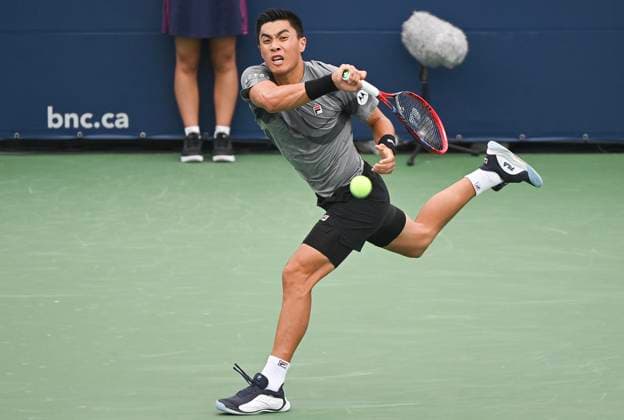 August 5, 2024, Montreal, Pq, Canada: Brandon Nakashima, of the United States, plays a shot to Billy Harris, of Great Britain, during their qualifying match at the National Bank Open tennis tournament in Montreal on Monday, August 5, 2024. Brandon Nakashima, Billy Harris, - ZUMAc35_ 20240805_zaf_c35_033 Copyright: xGrahamxHughesx