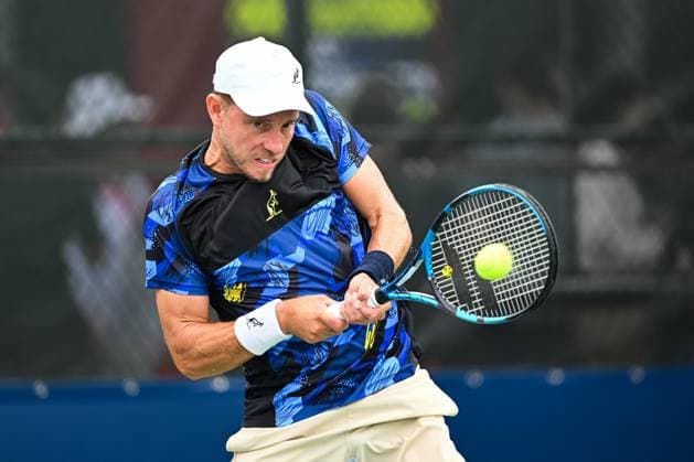 MONTREAL, QC - AUGUST 05: James Duckworth (AUS) returns the ball during a qualifying round match at ATP, Tennis Herren National Bank Open on August 05, 2024 at IGA Stadium in Montreal, QC (Photo by David Kirouac Icon Sportswire) TENNIS: AUG 05 National Bank Open EDITORIAL USE ONLY Icon240805001