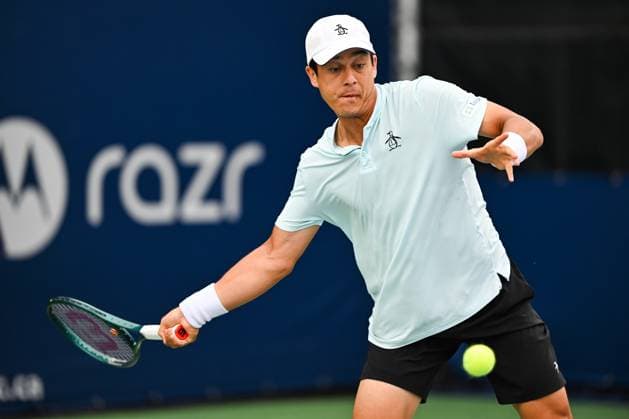 MONTREAL, QC - AUGUST 05: Mackenzie Mcdonald (USA) returns the ball during a qualifying round match at ATP, Tennis Herren National Bank Open on August 05, 2024 at IGA Stadium in Montreal, QC (Photo by David Kirouac Icon Sportswire) TENNIS: AUG 05 National Bank Open EDITORIAL USE ONLY Icon240805008