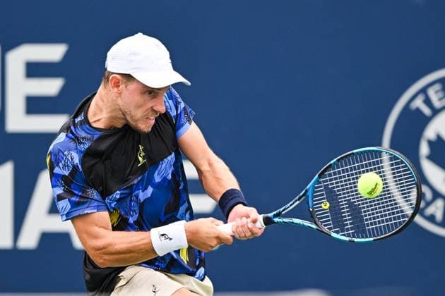 MONTREAL, QC - AUGUST 05: James Duckworth (AUS) returns the ball during a qualifying round match at ATP, Tennis Herren National Bank Open on August 05, 2024 at IGA Stadium in Montreal, QC (Photo by David Kirouac Icon Sportswire) TENNIS: AUG 05 National Bank Open EDITORIAL USE ONLY Icon240805022