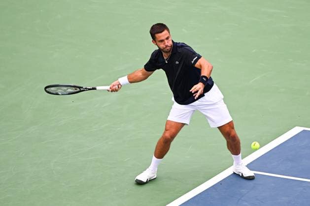 MONTREAL, QC - AUGUST 05: Alexis Galarneau (CAN) returns the ball during a qualifying round match at ATP, Tennis Herren National Bank Open on August 05, 2024 at IGA Stadium in Montreal, QC (Photo by David Kirouac Icon Sportswire) TENNIS: AUG 05 National Bank Open EDITORIAL USE ONLY Icon240805025