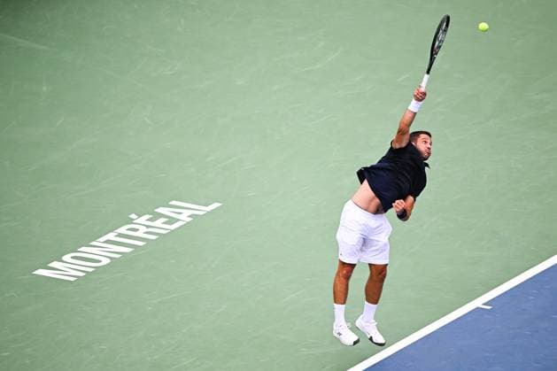 MONTREAL, QC - AUGUST 05: Alexis Galarneau (CAN) serves the ball during a qualifying round match at ATP, Tennis Herren National Bank Open on August 05, 2024 at IGA Stadium in Montreal, QC (Photo by David Kirouac Icon Sportswire) TENNIS: AUG 05 National Bank Open EDITORIAL USE ONLY Icon240805026