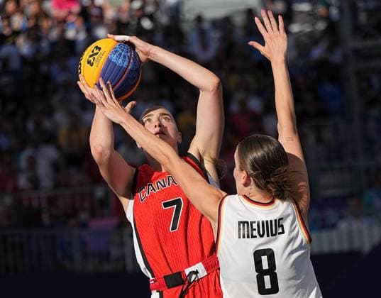 (240805) -- PARIS, Aug. 5, 2024 -- Paige Crozon (L) of Canada shoots during the women s semifinal of 3x3 basketball between Germany and Canada at the Paris 2024 Olympic Games, Olympische Spiele, Olympia, OS in Paris, France, Aug. 5, 2024. ) (PARIS2024) FRANCE-PARIS-OLY-3x3 BASKETBALL MengxYongmin 