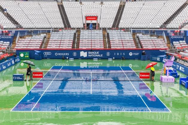 August 5, 2024, Montreal, Quebec, Canada: Rain delay in qualification rounds during the Canadian Open tennis tournament at IGA Stadium. Montreal Canada - ZUMA 20240805_mda_l189_579 Copyright: xYannickxLegarex