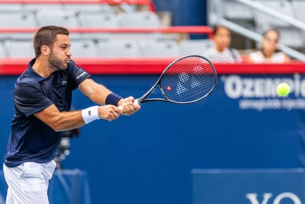 August 5, 2024, Montreal, Quebec, Canada: ALEXIS GALARNEAU from Canada returning service against Rinky Hijikata from Australia on central in qualification round at Canadian Open tennis tournament at IGA Stadium. Tennis 2024: Canadian Open  - ZUMA 20240805_mda_l189_585 Copyright: xYannickxLegarex