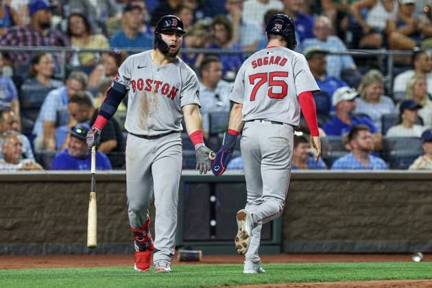 August 5, 2024: Boston Red Sox outfielder Wilyer Abreu (52) congratulates Boston Red Sox second baseman Nick Sogard (75) on scoring a run against the Kansas City Royals during the sixth inning at Kauffman Stadium in Kansas City, MO. CSM Kansas City United States of America - ZUMAc04_ 20240805_zma_c04_309 Copyright: xDavidxSmithx