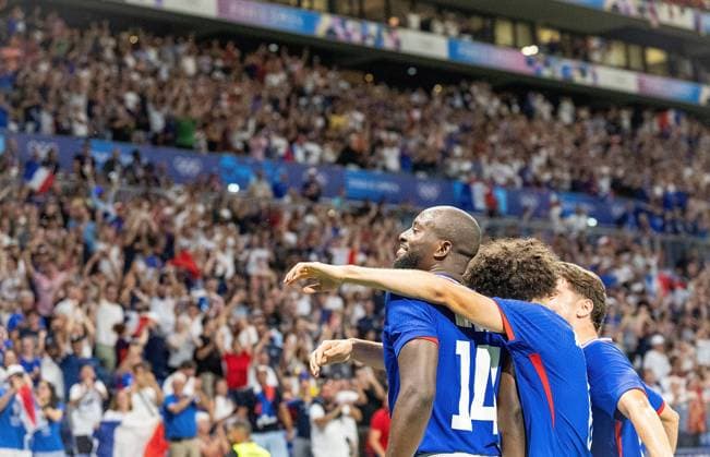 (240805) -- LYON, Aug. 5, 2024 -- Jean-Philippe Mateta (L) of France reacts during the men s simifinal match of football between France and Egypt of Paris 2024 Olympic Games, Olympische Spiele, Olympia, OS in Lyon, France, Aug. 5, 2024. ) (PARIS 2024)FRANCE-LYON-OLY-FOOTBALL SunxFei 
