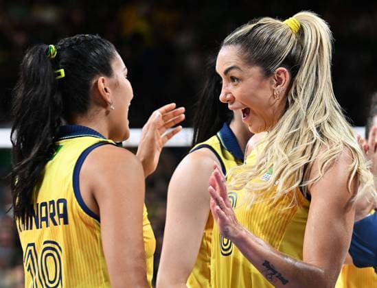 (240806) -- PARIS, Aug. 6, 2024 -- Thaisa Daher de Menezes (R) and Tainara Lemes Santos of Brazil celebrate after winning the women s quarterfinal match of volleyball between Brazil and the Dominican Republic at the Paris 2024 Olympic Games, Olympische Spiele, Olympia, OS in Paris, France, Aug. 6, 2024. ) (PARIS2024) FRANCE-PARIS-OLY-VOLLEYBALL LiuxDawei 