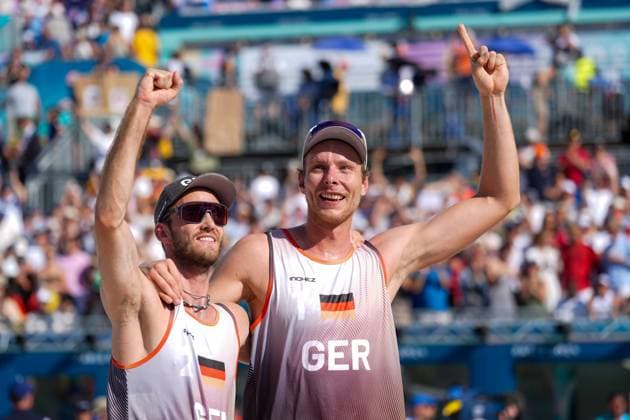 2024-08-06 Beach Volleybal - Olympic Games, Olympische Spiele, Olympia, OS Paris 2024 - Day 11 PARIS, FRANCE - AUGUST 6: Clemens Wickler and Nils Ehlers of Team Germany celebrating after competing in the Men s Quarter Final during Day 11 of Beach Volleybal - Olympic Games Paris 2024 at Eiffel Tower Stadium on August 6, 2024 in Paris, France. (Photo by Joris Verwijst BSR Agency) Paris France Content not available for redistribution in The Netherlands directly or indirectly through any third parties. Copyright: xBSRxAgencyx