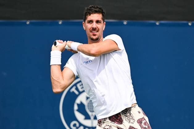 MONTREAL, QC - AUGUST 06: Thanasi Kokkinakis (AUS) returns the ball during a second round qualification match at ATP, Tennis Herren National Bank Open on August 06, 2024 at IGA Stadium in Montreal, QC (Photo by David Kirouac Icon Sportswire) TENNIS: AUG 06 National Bank Open EDITORIAL USE ONLY Icon240806009