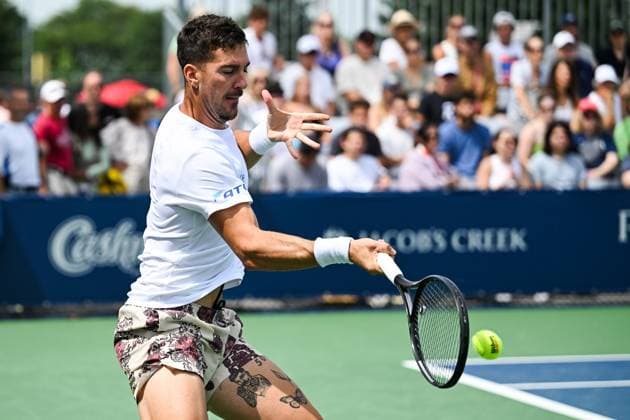 MONTREAL, QC - AUGUST 06: Thanasi Kokkinakis (AUS) returns the ball during a second round qualification match at ATP, Tennis Herren National Bank Open on August 06, 2024 at IGA Stadium in Montreal, QC (Photo by David Kirouac Icon Sportswire) TENNIS: AUG 06 National Bank Open EDITORIAL USE ONLY Icon240806014